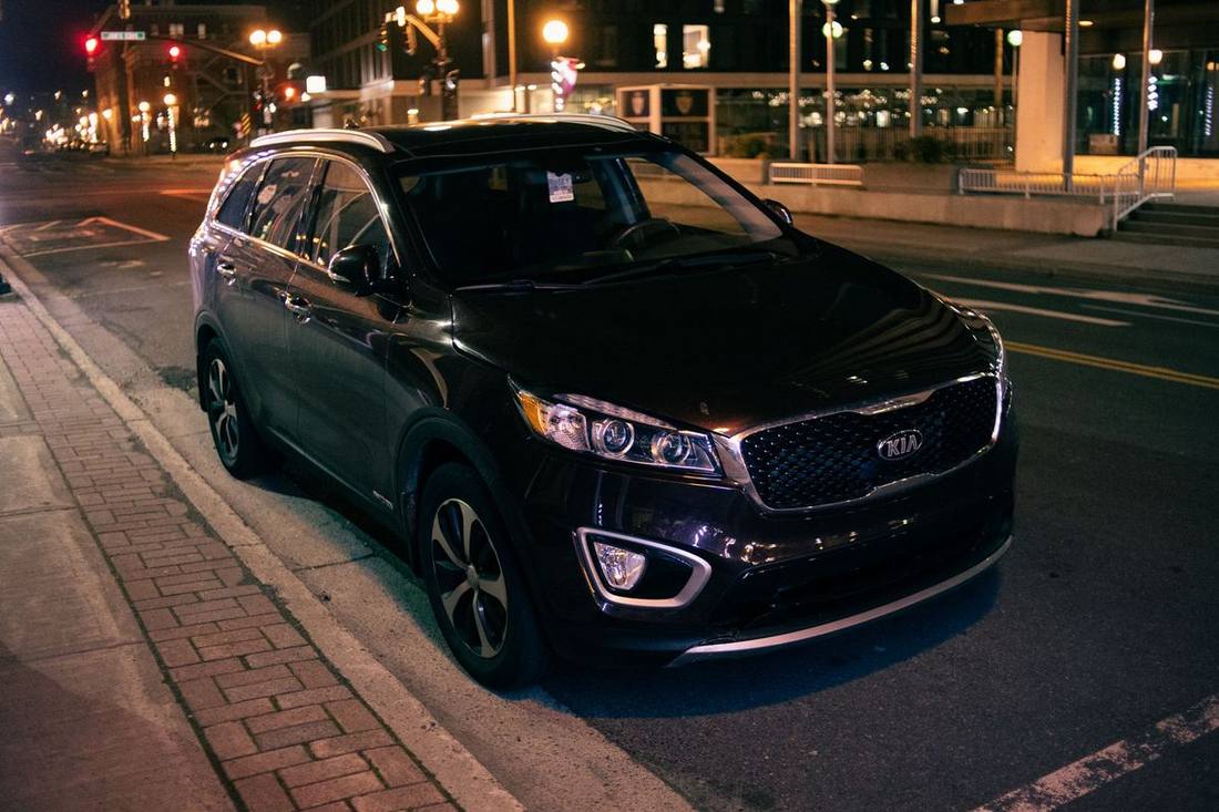 Black luxury SUV at night