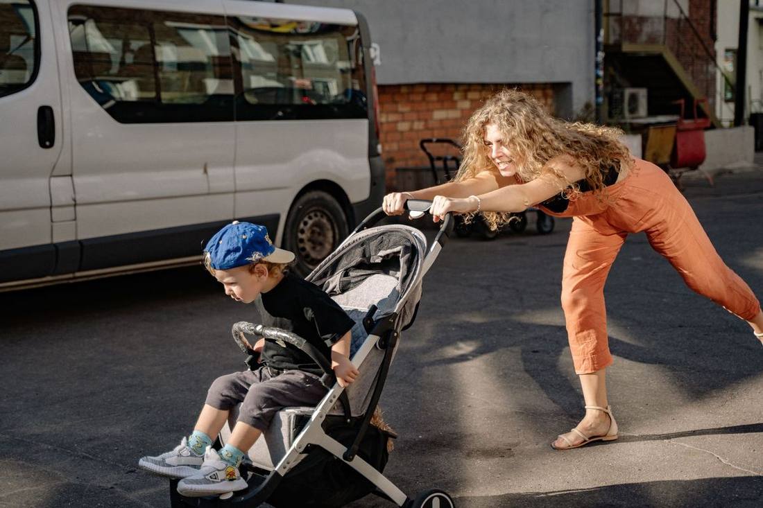 A family loading a Sprinter at Pearson with a stroller