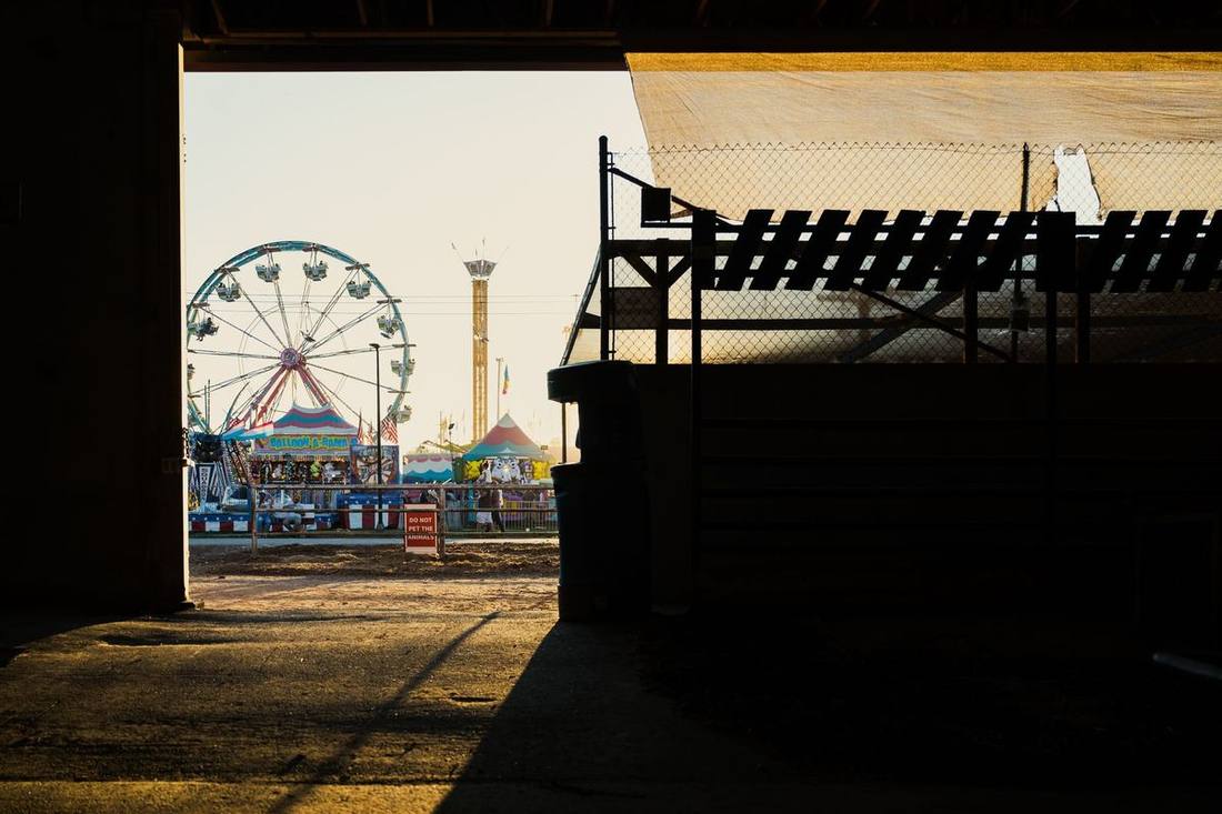 The CNE's midway at dusk with the Princes' Gates beyond