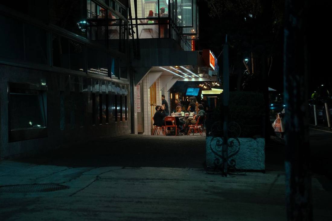 Employees boarding a Sprinter outside a downtown venue after a holiday party
