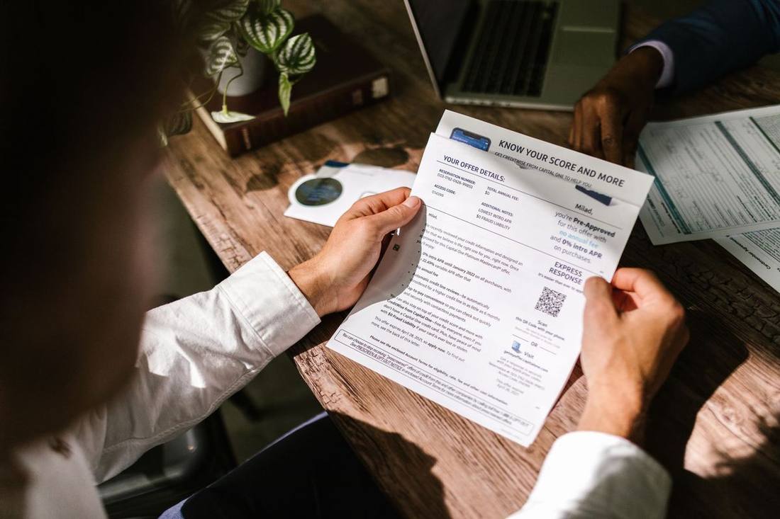 A travel manager reviewing a ground transportation statement