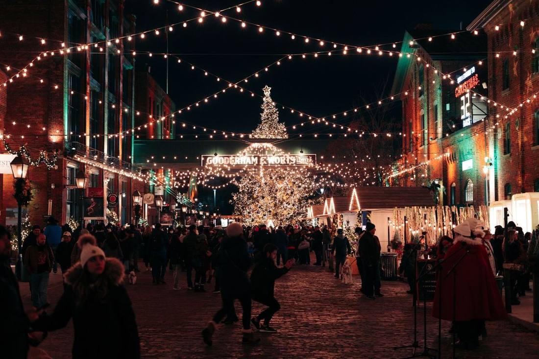 Cobblestone lane in the Distillery District lit for the Christmas Market