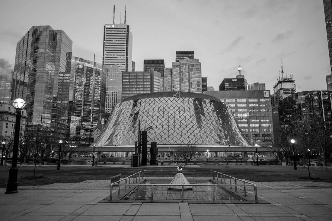 Eloping in Toronto: City Hall, a photographer and one very good car