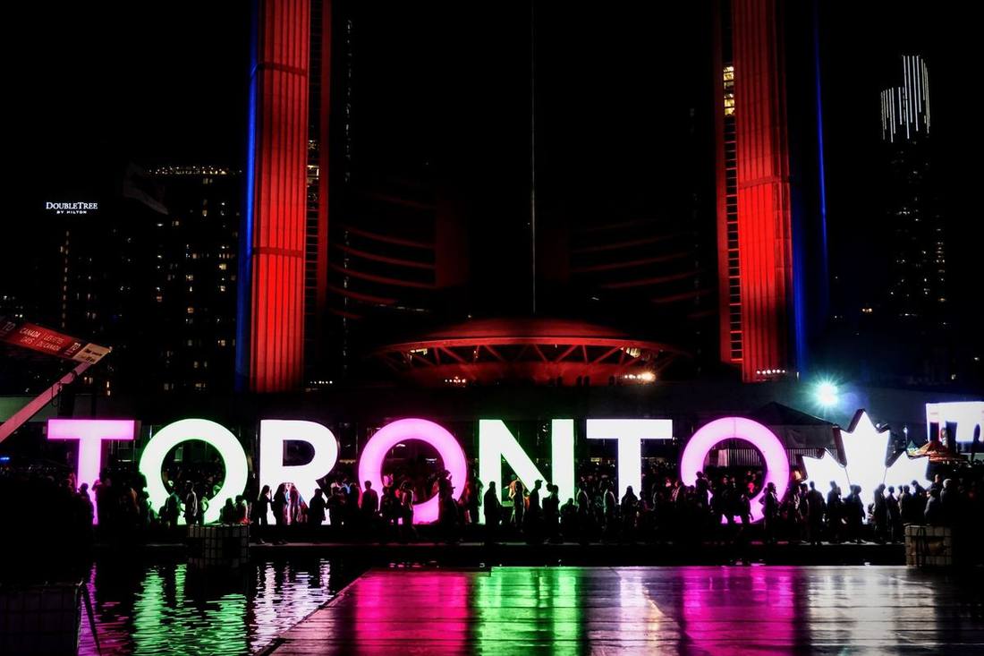 A Nuit Blanche installation lighting Nathan Phillips Square after midnight