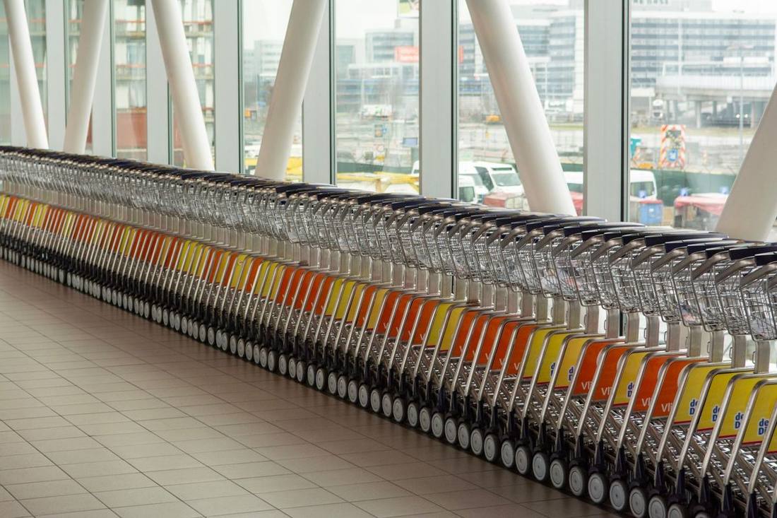 Pearson arrivals with strollers and luggage carts