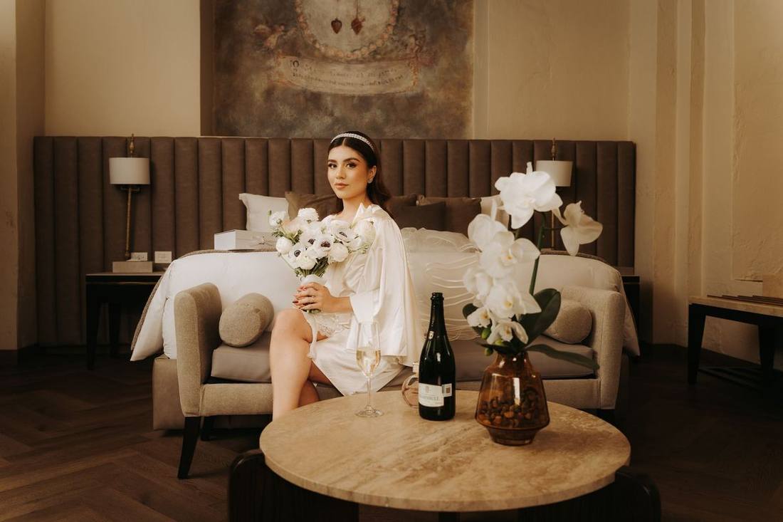 Champagne and flowers on the back seat of a stretch limousine