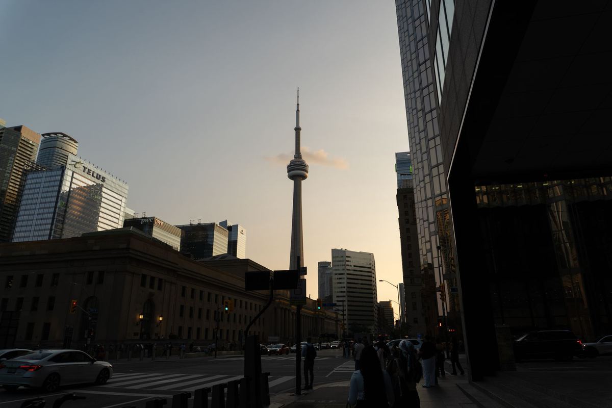 Downtown Toronto at dusk, the CN Tower over Front Street