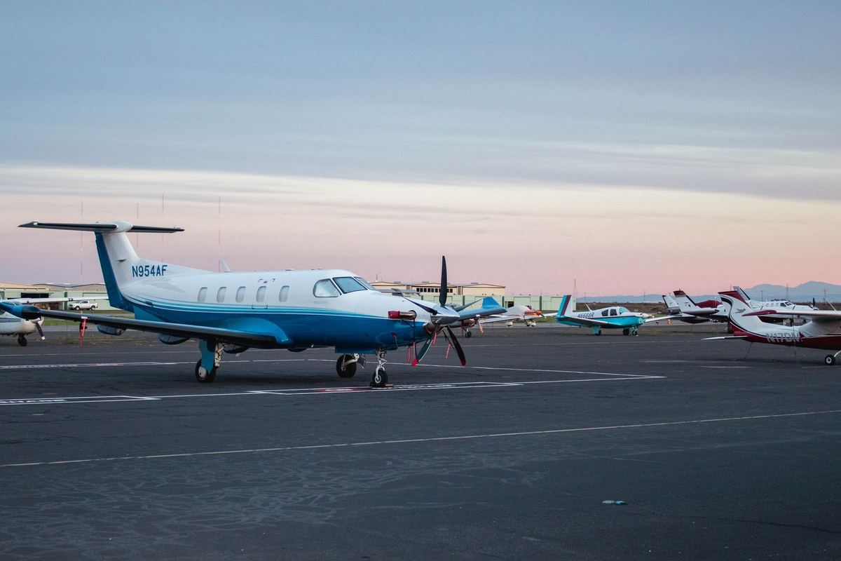 Business aircraft on the ramp at dusk